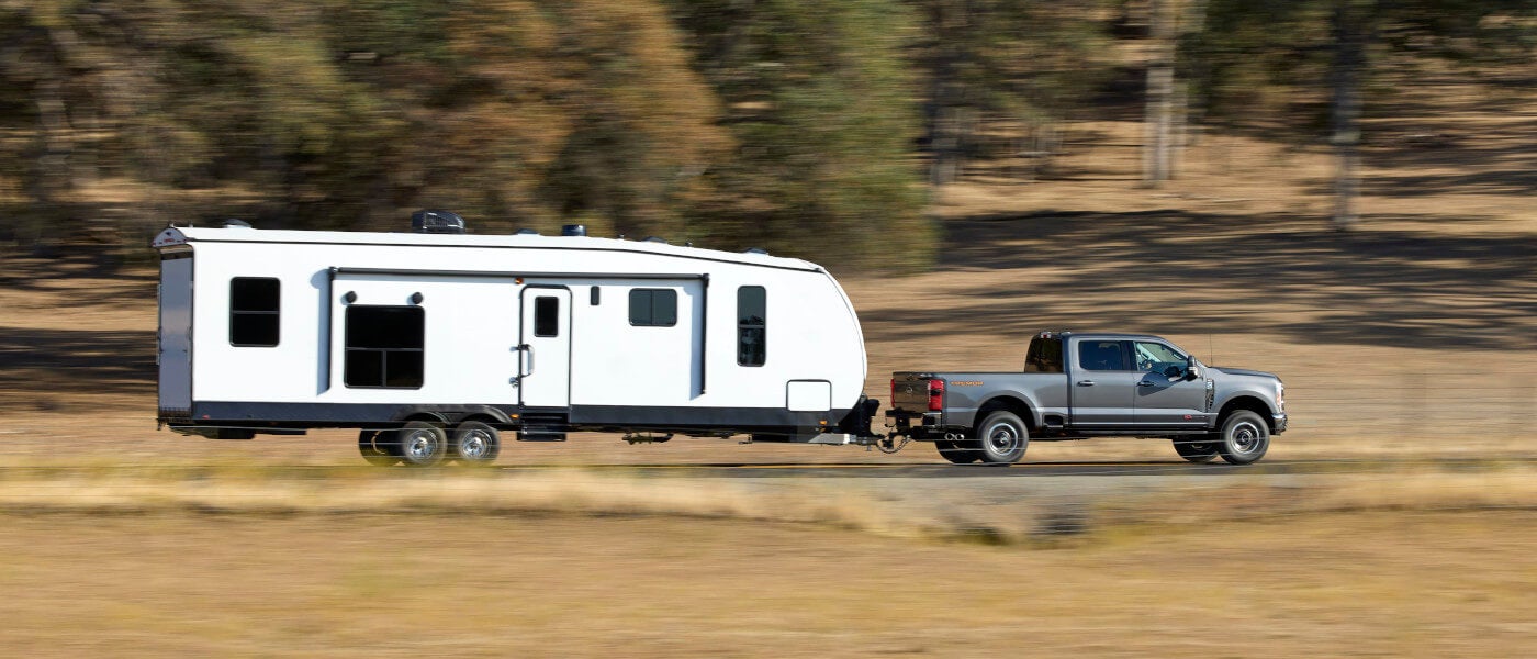 2026Ford-SuperDuty-ExteriorSideViewTowingRV