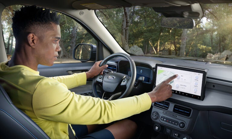 2026 Ford Maverick Interior Driver Using Infotainment System