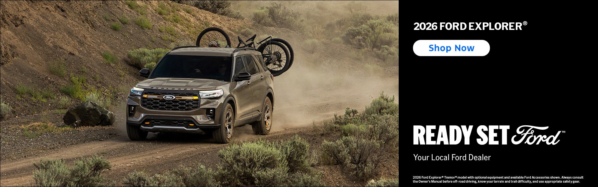 Ford Explorer with Bike Rack on a dirt road
